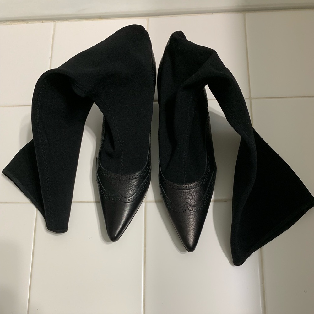 Bruno Magli black leather sock boot.